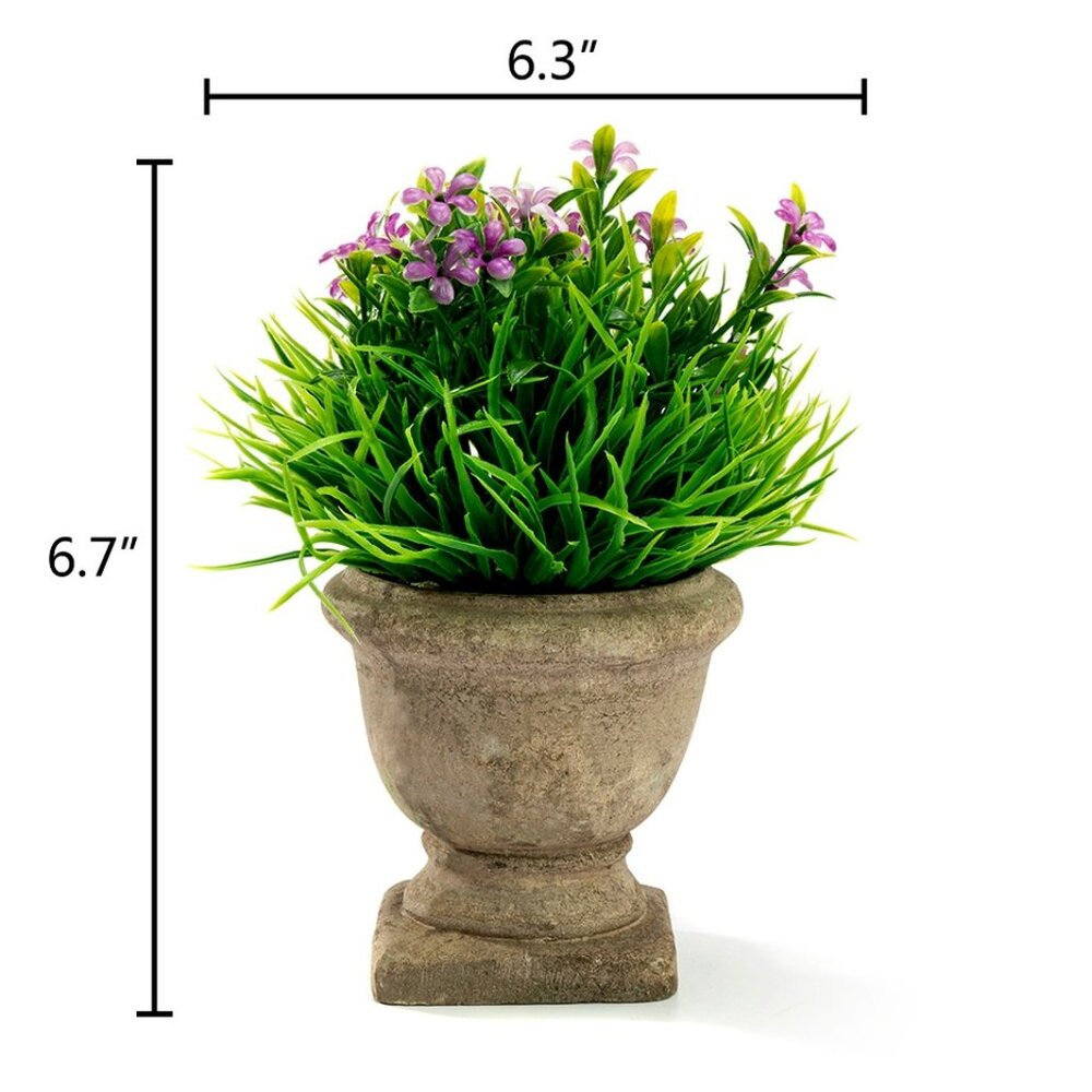 A Trophy Shape Mini Artificial Faux Grass and Purple Flower Plant in Paper Pulp